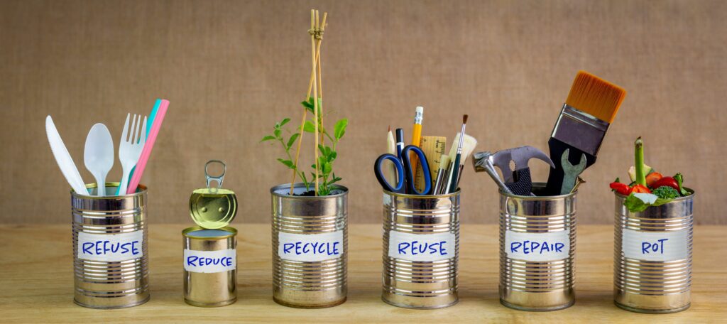 Managing a Zero Waste lifestyle, illustrated here with 6 tin cans with the labels, Refuse, Reduce, Recycle, Reuse, Repair, Rot to inspire others to live more sustainably